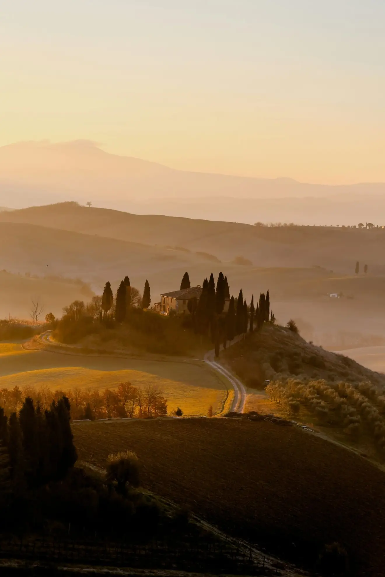 The Val d'Orcia in Tuscany at golden hour: Italy's Digital Nomad Visa was gazetted in April 2024 but only became genuinely operational after its implementing guidance landed in March 2026